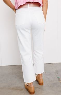 Elevate your denim collection with our Sam Hem Detail Straight Jeans in White – a sleek and modern addition to your wardrobe that embodies contemporary style. These jeans aren't just bottoms; they're a statement of urban sophistication and a nod to the latest trends. Crafted with meticulous attention to detail, the Sam Hem Detail Straight Jeans feature a crisp white hue and a straight leg silhouette with on-trend hem detailing. The versatile design allows for easy pairing with a variety of tops, Modern White Pants With Five Pockets, Modern White Cropped Leg Bottoms, White Cropped Leg Modern Bottoms, Modern White Jeans For Work, Relaxed Fit Mid-rise Jeans For Day Out, Chic White Jeans With Straight Hem, Chic White Straight Hem Jeans, Modern High Rise White Pants, Chic White Pants With Five Pockets