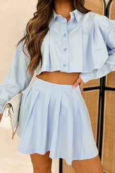 SELF: 100% COTTON. LINING: 100% RAYON Brand: Mable Model Wearing Size Small Color: Light Blue Comes As A Set: Top & Skirt Top: Collared Shirt, Button-Front, Pleat Details, Long Sleeves, Oversized Fit, Cropped Length Skirt: Pleated Skirt Overlay, Shorts Lining, Side Zipper Closure, Mini Length Neither Piece Has Stretch Top: 19" Armpit To Sleeve End, 7" Armpit To Hemline Skirt: 15" Waistline To Hemline For Model Size Specs Please Check Size Charts Launched: 1/29/24 Spring Button-up Sets For Day Out, Blue Buttoned Sets For Spring, Blue Buttoned Set For Spring, Elegant Cotton Sets With Buttons For Spring Daywear, Spring Blue Set With Buttons, Spring Button-up Day Out Sets, Spring Day Out Button-up Sets, Casual Button-up Mini Skirt For Spring, Spring Daywear Sets With Button Closure