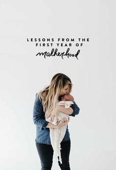 a woman holding a baby in her arms with the words lessons from the first year of motherhood