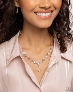 Featuring square fittings, a glistening row of white rhinestones cascades from a dainty gold chain below the collar. White gems, encircled by rhinestone arches form glittery petals for a sparkling centerpiece. Features an adjustable clasp closure. Sold as one individual necklace. Includes one pair of matching earrings. Purple Anklet, Bedazzled Jewelry, Blue Hair Accessories, Dainty Gold Chain, Urban Jewelry, Yellow Jewelry, Brown Bracelet, Brown Jewelry, Silver Jewelry Necklace