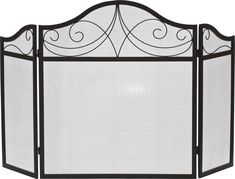 an iron fireplace screen with scroll designs on the top and bottom panel, in black