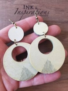 Fall in love with these stunning Country Fringe earrings crafted from wood! Perfect for indie styles, from bohemian chic to sophisticated rocker, these lightweight dangle earrings come in 3 sizes so you can choose just the right statement look. They make a great gift for the ladies in your life. With a mix of brushed metal and rustic spots, they look like worn leather, giving them an enviable patina. Each pair is laser engraved and features bronze, silver or gunmetal findings. Wear them and get Wood Hoop Earrings, Unique Hoop Earrings, Large Dangle Earrings, Wood Dangle Earrings, Boho Country, Engraved Earrings, Essential Oils Gifts, Types Of Earrings, Wooden Hoop