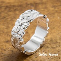 Custom order and Hand made in the Aloha StateHand engraved with Old English design - Hawaiian Maile, Plumeria, and Ocean wave.Ring is perfect for people with an active life style, also great gift for anniversary, wedding or any special occasion.*Free inside message engraving. To make the piece more personal, you can add a special message on the inside of the ring, bracelets or pendant. Inside inscription on traditional Hawaiian Heirloom Jewelry is free when placed at the time of order. Inscripti Luxury Engraved Turquoise Ring As Gift, Personalized Engraved Sterling Silver Ring, Luxury Sterling Silver Engraved Women's Ring, Luxury Customizable Sterling Silver Engraved Ring, Luxury Engraved Turquoise Ring Gift, Hawaiian Heirloom Jewelry, Blue Diamond Jewelry, Old English Letters, Cutout Style