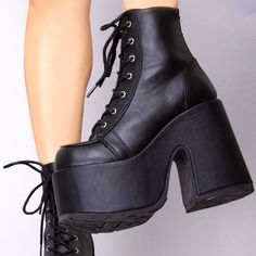 They’ll Get Out Of Your Way In The Here For Trouble Plafrom Boots From Demonia. These Bada$$ Festival Boots Feature A Vegan Leather Upper, Lace Up Front, Ultra Platform, And Zipper Closure Up The Back. Being Bad Never Looked So Good. - 5" (127mm) Chunky Heel - 3" (75mm) Platform - Lace-Up Ankle Boot - Metal Back Zip Closure High Ankle Lace-up Boots With Platform, Casual Lace-up Platform Heels, Synthetic Platform Lace-up Boots, Lace-up Boots With Reinforced Heel And Medium Width, High Ankle Platform Heels Medium Width, Platform High Ankle Heels, Chunky Platform Lace-up Boots In Synthetic Material, Synthetic Chunky Platform Lace-up Boots, Synthetic Lace-up Boots With Chunky Platform