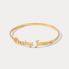 Be on top of the fashion game with this personalized cuff bracelet! Add your name or a special phrase for a unique look that's sure to turn heads. Not to mention the compliments that’ll be rolling in! (Ain't no outfit complete without it!) DETAILS Plating: 18K Gold Materials: 18K Gold on Steel Measurements:  Adjustable 2.76"*2.76"(7cm*7cm) Weight:  7.0 g * Please allow 15-20 days for customing before shipping Adjustable Custom Name Bracelet Bangle, Adjustable Custom Name Bangle Bracelet, Custom Name Adjustable Bangle Bracelets, Adjustable Bangle Bracelet With Custom Name, Custom Name Adjustable Bangle Bracelet, Engraved Adjustable Bangle Name Bracelet, Custom Name Nameplate Bracelet For Friendship, Personalized Name Bracelet As A Trendy Gift, Personalized Name Bracelet Trendy Style