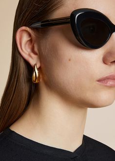 The Small Olivia Hoop Earrings in Gold– KHAITE Earrings In Gold, Earring Crafts, Small Earrings, Pierced Ears, Ear Piercings, Sale Items, Hoop Earrings, In Italy, Plating