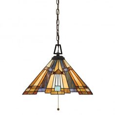 a stained glass light hanging from a chain