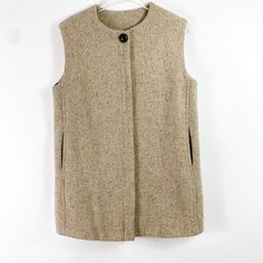 Cream Tweed Vest By Ottod'ame Women's Size 4 Approximate Measurements: Chest Length 17” Length 31” Vest Button Closure Tweed Winter Outerwear Casual Good Preowned Condition. Msrp $295 Shop With Confidence Knowing That Every Item Is Hand Selected And Packaged With Care. Ships Next Business Day! Casual Tweed Vest For Winter, Classic Beige Vest For Fall, Brown Tweed Outerwear For Spring, Casual Beige Tweed Outerwear, Spring Brown Tweed Outerwear, Beige Winter Workwear Vest, Tweed Vest, Winter Outerwear, Suit Vest