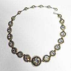 Beautiful HOLLYCRAFT Crystal Aurora Borealis blue and Goldtone necklace. 1950's- 1960's great condition. Measures approximately 17" long. Does have 3 small stones missing but it's in the back part and not terribly noticable imo. I purchased this beautiful piece about 20 years ago while working at an antique mall. Please see the pictures for details. Ships from a smoke free pet free home. Everything has been washed as well. Thanks for looking! :D Palm Beach Fl, Antique Mall, Gold Tone Necklace, Choker Necklaces, West Palm Beach, West Palm, Blue And Gold, Aurora Borealis, Palm Beach