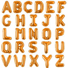 the letters and numbers made out of gold foil balloons are shown in this alphabet set