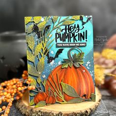 a card that says hey, pumpkin you have seen no end on top of a tree stump