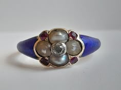 Adorable antique early georgian ring. rare item, ca. 1730. not hallmarked but tested as 15 ct gold. adorned by high quality blue enamel and natural gems: pearls, old cut diamond and rubies. it has a hidden locket but no glass, that can be added by professional jeweller. uk size l. us size 5 3/4. pics are enlarged so you can see the exact detail of the gems. this ring is much prettier in real. weight is 2.30 grams. excellent used condition. some wear commensurate with age. thank you for viewing. Antique Ruby Ring, Georgian Ring, Vintage Jewelry Antique, Ring Pearl, Historical Jewellery, Antique Ring, Enamel Ring, Pearl Diamond