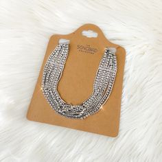 Our Zoe Rhinestone Strands Necklace is the perfect necklace for adding attention grabbing sparkle and glam to your outfit. The charm of this necklace comes from the separate strands of rhinestones that adorn your neckline. Maximum length is about 16 inches, it fits like a loose choker. This is a special occasion item, and it is FINAL SALE Rocker Chic Jewelry, Rocker Chic, Chic Jewelry, Strand Necklace, Clear Rhinestones, Silver Necklaces, Rocker, Final Sale, Choker