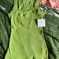 Athleta Green Tank. Size M New With Tags. Fitted Green Tank Top With Scoop Neck, Fitted Green Scoop Neck Tank Top, Green Scoop Neck Sports Top, Green Scoop Neck Athleisure Top, Basic Green Tank Top, Green Scoop Neck Top Athleisure Style, Green Stretch Basic Tank Top, Spring Athleisure Fitted Tank Top, Fitted Athleisure Tank Top For Spring