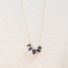 Add a pop of color with a teardrop-shaped blue sapphire necklace. Crafted from solid 10k yellow gold, this necklace features a lab-created blue sapphire of 2.75 ct. Diamond Cleaner, Ultrasonic Cleaners, Blue Sapphire Necklace, Sapphire Necklace, Pop Of Color, Precious Gems, Jewelry Case, Blue Sapphire, Gemstone Jewelry