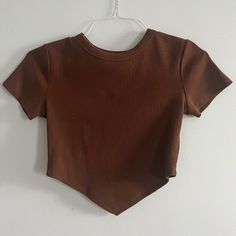 Never Worn, In Good Condition, Medium, Brown T-Shirt From Forever 21. Trendy Brown T-shirt For Spring, Brown Short Sleeve Crop Top For Spring, Spring Brown Short Sleeve Crop Top, Brown Short Sleeve Cotton Crop Top, Brown Cotton Crop Top, Brown Cotton Short Sleeve Crop Top, Brown Graphic Tee For Spring, Fitted Brown Graphic T-shirt, Trendy Brown Crew Neck Top