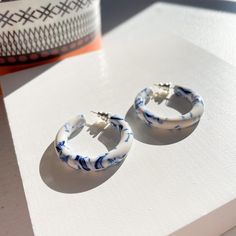 35 Round Hoops in Porcelain Thick Chunky White and Blue Hoop | Etsy Blue Hoop Earrings, Blue And White Earrings, Porcelain Earrings, Porcelain Jewelry, Earring Cards, Cellulose Acetate, Jewelry Lookbook, Ceramic Jewelry, Pretty Jewellery