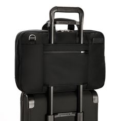 This brief is your go-to for overnight business tripsno additional bag needed. Its equipped with a three-section design (plus expansion) to accommodate and organize all of your devices, documents, and even a change of clothes. Fits up to 17" laptops. Versatile Business Luggage With Sleeve, Functional Rectangular Luggage For Work, Nylon Laptop Bag With Functional Pockets For Business, Modern Nylon Briefcase With Luggage Sleeve, Versatile Business Luggage, Modern Workplace Bags With Luggage Sleeve, Functional Rectangular Luggage With Laptop Sleeve, Nylon Briefcase With Luggage Sleeve For Business, Business Nylon Bags With Luggage Sleeve