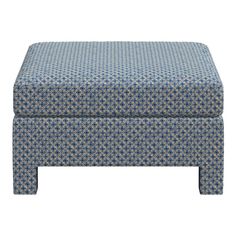 a blue and white footstool on a white background