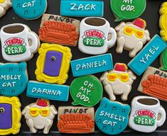 decorated cookies with words and pictures on them