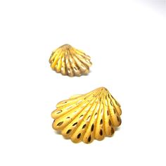 "Vintage seashell earrings, gold toned finished.post back earrings. Sea shell jewelry, nautical. Scallop shell earrings.Beach seaside jewelry, summertime bling. Size of earrings: 1\" x .75\" or 2.5 x 1.8 cm approxinately Condition: Fair. A fair amount of wear on the front. The finish is worn away a bit and tarnish on the underside. See photos above. There are no back to the posts. Would be lovely worn or re-purposed! You might like: http://www.etsy.com/listing/103610925/strawberry-purse-basket-c Sea Shell Jewelry, Earrings Beach, Seashell Earrings, Seashell Jewelry, Scallop Shell, Book And Magazine, Scallop Shells, Shell Jewelry, Shell Earrings