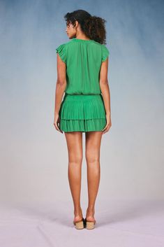 Done in a verdant shade, this short-sleeve mini dress ties up at the neckline and cinches in at the waist before falling to a thigh-skimming tiered hem with crisp, raw edges. The perfect one-and-done number for date night - not to mention one of Current Air's most popular dress. •V-neckline with tie •Relaxed fit •Ruffle trim •Pleated cap sleeves •Elasticized waist •Tiered pleated skirt •Raw edges Item number 1990061-1100% Polyester Dry clean Imported Popular Dress, Pleated Mini Dress, Popular Dresses, Short Sleeve Mini Dress, Spring Green, Tie Dress, Trending Dresses, Mini Dress With Sleeves, Spring Dresses