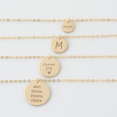 "CLASSIC GOLD DISC NECKLACE Choose your disc size! Our engraved disc necklaces come in 4 sizes, mini 3/8\", small 1/2\", medium 5/8\"or large 3/4\". Engraved and hand assembled with care and love, it comes in 14k gold fill, rose gold fill, or sterling silver. Perfect for layering with our bar necklaces and dainty stone necklaces. * Listing is for one disc necklace, your choice of size HOW - TO - ORDER 1. Select your options from the drop down menu see photo for font styles and symbol options 2. Gold Customizable Charm Necklaces With Round Pendant, Customizable Gold Charm Necklace With Round Pendant, 14k Gold Name Necklace With Round Shape, 14k Gold Round Necklace With Name Detail, 14k Gold Round Necklace With Name, Gold Engraved Round Disc Charm Necklace, Gold Stamped Initial Pendant Charm Necklace, Gold Stamped Initial Pendant Necklace, Customizable Gold Round Disc Charm Necklaces