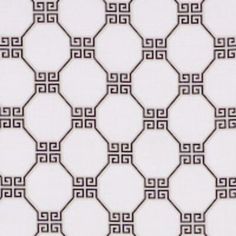 a white and black wallpaper with an intricate design