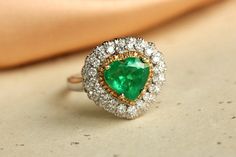 *Condition: Brand new *Center Stone: Natural Emerald from Colombia, Heart Cut approx 3.1ct (IF Color, 5A Color) *Side Stone: Natural White Diamond, round cut (VS1 clarity and F color) *Gold Weight: 4.76g *Ring and pendent two in one Each piece is made-to-order with care and special attention to detail. all items are made with conflict-free diamonds and gems. Size: made to order The item will be gift wrapped and shipped. --------------------------------------------------------- Available in : 14k Elegant Gia Certified Trillion Cut Jewelry, Luxury Heart-shaped Emerald Jewelry, Fine Jewelry Gia Certified Heart-shaped, Fine Jewelry Heart-shaped Gia Certified, Gia Certified Fine Heart Shaped Jewelry, Luxury Heart Cut Gia Certified Jewelry, Gia Certified Heart-shaped Fine Jewelry, Luxury Gia Certified Heart Cut Jewelry, Luxury Jewelry With Trillion Cut Center Stone