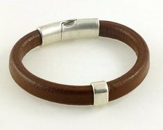 Celtic Bracelet Unisex Bracelet Mens Brown by siriousdesign Classic Adjustable Brown Bracelets, Everyday Brown Wristband With Bracelet Strap, Modern Brown Wristband As A Gift, Minimalist Brown Bracelet With Leather Strap, Minimalist Brown Bracelets With Leather Strap, Modern Brown Bracelets For Everyday Use, Classic Brown Leather Bracelet For Everyday, Minimalist Brown Leather Bracelet For Gift, Modern Brown Bracelets For Everyday