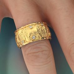 Embrace the timeless elegance of history with our Ancient Roman Style Gold Ring, a beautifully crafted piece that echoes the grandeur of the Roman Empire. This stunning ring features a classic design, highlighted by a sparkling diamond band, making it a perfect blend of ancient artistry and modern sophistication Band measurements: approx. 10mm wide , approx 2 mm thickMaterial: 18 solid gold, 14k solid goldColor: white gold, yellow gold and rose goldStone Type: 100% Natural DiamondsShape: 13 Roun Gold Ring Diamond, Roman Style, The Roman Empire, Jeweled Earrings, Roman Fashion, Sparkling Diamond, Ring Pendant Necklace, Unisex Jewelry, Ancient Romans