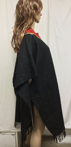 "Poncho top,Indian Poncho,Ethnic Large,Poncho ,Black ,Red Velvet collar, Fringed Measurements\" Width 35\" Length 38\" Fringe 2 1/2\" Good condition J 477 Poncho top,Indian Poncho,Ethnic Large,Poncho ,Black ,Red Velvet collar, Fringed" Black Bohemian Poncho Shawl, Black Shawl Cape For Festival, Black Long Sleeve Poncho For Beach, One Size Black Cape For Festival, Black Long Sleeve Beach Poncho, Black Bohemian Cape For Festivals, Bohemian Black Cape For Festival, Bohemian Black Poncho For Fall, Black One Size Poncho For Beach