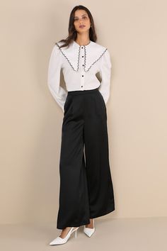 The Lulus Stunning Chicness Black Satin High-Rise Wide-Leg Pants will easily elevate any of your favorite fall 'fits! Sleek woven satin shapes these must-have pants that feature a high, banded waist (with elastic at the back for fit) and trendy, wide pant legs with pleated details, side seam pockets, and full-length hems. Hidden side zipper/clasp. Add a sweater and some boots and you'll instantly have a perfect ensemble! Fit: This garment fits true to size. Length: Floor length. Size medium Inse High Waist Silk Wide Leg Pants For Work, Formal Satin High-waisted Wide Leg Pants, Formal High-waisted Satin Pants, Chic High-waist Wide Leg Silk Pants, Chic High Waist Silk Wide Leg Pants, Satin Pants For Workwear, High-waisted Satin Pants For Formal Occasions, High-waisted Silk Wide Leg Pants For Work, Formal Satin Pants For Spring