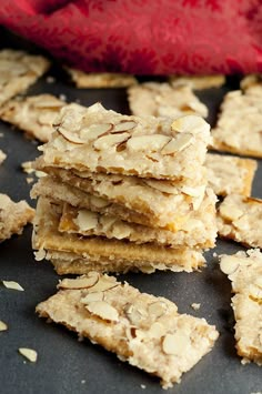 several pieces of oatmeal and almond crackers stacked on top of each other