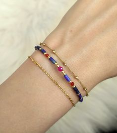 Cleopatra. Inspired by the ancient egyptian queen Cleopatra. This bracelet is composed of 14K gold vermeil delicate components, genuine blue lapis lazuli, orange carnelian and pink ruby gemstones. With the essence of the ancient egyptian jewelry.  Available in: ❉ 14K Yellow Gold vermeil ❉ 14K Rose Gold vermeil ❉ 925 Sterling Silver You can choose between 6 chain lengths: 5.5 / 6 / 6.5 / 7 / 7.5 / 8 inches Not sure which length to buy? We can add a 1 inch extender chain. Just write a note at checkout! ❈ We send all our items with registered mail. ❉ Due to the organic nature of stones, there might be a slight variation in colour, size and shape. ✺ All items come packaged in a quality velvet pouch ready for gift giving. ✽ If you want to make a special order, just contact us! Gold Bracelets With Lapis Lazuli And Natural Stones, Gold Lapis Lazuli Bracelets For Gift, Elegant Adjustable Lapis Lazuli Beaded Bracelet, Gold Lapis Lazuli Bracelet With Gemstone, Gold Lapis Lazuli Spiritual Bracelets, Handmade Gold Beaded Lapis Lazuli Bracelets, Adjustable Blue Lapis Lazuli Bracelets, Gold Beaded Lapis Lazuli Bracelets, Luxury Gold Lapis Lazuli Bracelets