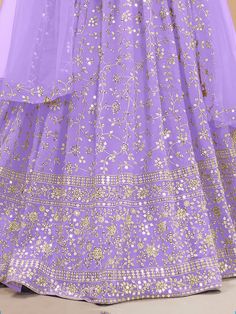 Fill vibrant hues in the upcoming wedding season with our fascinating Lehenga choli collection. This enchanting lavender sequins georgette lehenga choli with dupatta is the perfect pick for your weddings, receptions, and other occasions. Crafted with the utmost attention to detail, this stunning ensemble will surely make you stand out from the crowd.
The first and most evident benefit is its captivating color. Lavender exudes elegance and sophistication, making it an ideal choice for any special Eid Sequinned Purple Sets, Eid Purple Sequin Sets, Purple Sequined Sets For Eid, Lavender Sets With Intricate Embroidery For Festive Occasions, Festive Lavender Sets With Intricate Embroidery, Festive Lavender Choli With Sheer Dupatta, Festive Lavender Lehenga With Sheer Dupatta, Lavender Semi-stitched Sets With Intricate Embroidery, Lavender Wedding Set With Sheer Dupatta