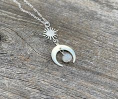 Gorgeous dainty boho witchy crescent moon and/or sun necklace. Long lasting Gold or silver plated moon/sun with natural drip moonstone bead with the chain option of your choice! Perfect for everyday wear, gifts for bohemians. Hypoallergenic nickel & lead free material -Silver plated cable chain -Silver plated satellite chain -18k Gold plated cable chain -18k Gold plated satellite chain -Sterling silver cable chain (read description below) -14k gold filled cable chain (read description below) Bohemian Moonstone Jewelry With Moon Charm, Spiritual Sterling Silver Crystal Necklace With Moon Charm, Bohemian Moonstone Jewelry With Moon Phase Detail, Bohemian Moonstone Jewelry With Moon Phase, Mystical Sterling Silver Crystal Necklace With Moon Charm, Celestial Moonstone Necklace With Sun And Moon Design, Bohemian Moon Phase Necklace In Sterling Silver, Sterling Silver Necklaces With Sun And Moon Design, Bohemian Sterling Silver Moon Phase Necklace