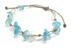 Gorgeous beach bracelet or anklet made with light aqua blue sea glass pebbles on our durable hand spun rope cord. Pure island style! Easy and secure adjustable slide knot closure allows for easy on and off. This bracelet/anklet is completely waterproof and metal free making it perfect for anyone with skin sensitivities and is a wonderful and unique gift for those hard to shop for friends and family on your list, especially the beach lovers! Color: Aqua Blue Size: Available in three sizes. Bracel Blue Glass Beaded Bracelets For Beach, Adjustable Blue Jewelry Made Of Recycled Glass, Adjustable Blue Recycled Glass Jewelry, Adjustable Blue Jewelry With Recycled Glass, Adjustable Recycled Glass Beaded Bracelets For Beach, Adjustable Turquoise Glass Bracelets, Adjustable Light Blue Bracelets For Beach, Turquoise Glass Beach Jewelry, Beach Turquoise Glass Jewelry