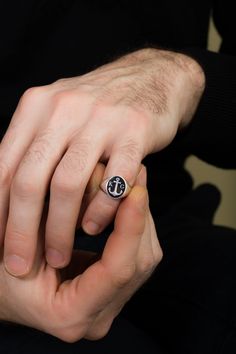 Anchor Silver Ring with two letters of your choice on each side of anchor. (leave note on checkout) ✪ Classic Elegant design for men appearance with black enamel filling at face. ☛ Ring size as preferred, as it is custom created for you in our workshop. (select your ideal one in drop down menu) ☛ Custom design inside ring with your own personalized logo / pattern / symbol is possible. Contact us now! ❏ Material: ✪ Ring made of Sterling Silver 925 ✪ Black Enamel + Additional styles: ✪ Red Enamel Symbolic Oval Rings With Polished Finish, Oval Silver Signet Ring For Promise, White Gold Oval Signet Ring For Promise, Personalized Oval Signet Ring Symbolic Style, Symbolic Personalized Oval Signet Ring, Oval Hallmarked Signet Ring For Promise, Symbolic Oval Signet Ring Personalized, Silver Oval Initial Ring For Promise, Symbolic Oval White Gold Signet Ring