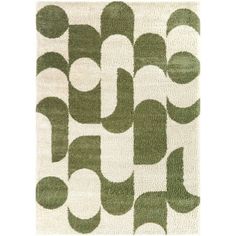 a green and white rug with circles on the bottom, in front of a white background