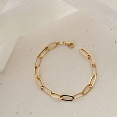 Introducing our 14K Gold Paperclip Chain Bracelet, featuring unique Italian paperclips. This elongated link chain for women is a trending statement piece, perfect as a gift for her. Crafted from genuine 14K solid gold, it ensures lasting quality and sophistication. Elevate your accessory collection with this fashionable and timeless gold bracelet, ideal for any occasion. -- ⋆ This product is designed with Runda's fine handcrafting with sustainable methods. ⋆ Express-insured shipping to the whole Environmental Ethics, Chain For Women, Gold Armband, Statement Bracelet, Recycled Gold, White Rose Gold, Chain Link Bracelet, Paper Clip, Bracelet Gift