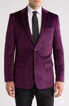 Look sophisticated at your next soirée in this dapper dinner jacket crafted from luxuriously soft velvet. Two-button closure Notched lapels Chest welt pocket; front flap pockets Lined 100% polyester Dry clean Imported Velvet Business Tuxedo Outerwear, Classic Velvet Outerwear With Button Closure, Formal Velvet Blazer With Button Closure, Velvet Blazer With Button Closure For Formal Occasions, Classic Single Button Outerwear For Party, Business Velvet Outerwear With Lapel Collar, Velvet Notch Lapel Blazer With Single Button, Velvet Single Button Blazer With Notch Lapel, Classic Formal Velvet Outerwear