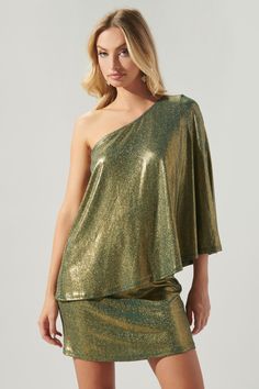 We're not in Kansas anymore. Be the star of the party in this foil ribbed dress. It features a one shoulder double layer detail with a bodycon skirt. Wear it out with gold accessories and black strappy heels for the perfect goddess look.- Foil ribbed knit- One shoulder- Double layer- Color: EmeraldSize + Fit - Model is 5'10" and wearing size XS- Measurements taken from size S - Chest: 32 1/4"- Length: 33" fabricSelf: 95% Polyester, 5% Spandex style numberD6041A Glamorous Gold Mini Dress For Holiday Party, Gold Bodycon Dress For Evening Holiday, Gold One-shoulder Evening Mini Dress, Gold Off-shoulder Dresses For Night Out, Elegant Gold One-shoulder Dress For Night Out, Gold Fitted One Shoulder Dress With Asymmetrical Neckline, Gold Fitted One-shoulder Dress With Asymmetrical Neckline, Gold Asymmetrical Dress For Night Out, Gold Fitted One-shoulder Dress