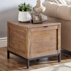 Store your essentials stylishly with the iNSPIRE Q Storage Trunk End Table with Removeable Tray by iNSPIRE Q Artisan. Featuring a warm brown wood finish and black metal base for a rustic contrast. The trunk table stores plenty of items that tuck away and has a wood tray. The wood tray is removable so that you can not only place items on top but take your items with you. The contemporary table blends well in any space and is perfect for a family that needs a stylish space saving solution. Feature Rancher Homes, Trunk End Table, Storage Tables, Trunk Table, Storage Trunk, Contemporary Table, Wood Tray, Warm Brown, Table Storage