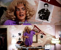 a woman holding a sign with the caption elvis elvis let me be keep that pels far from me