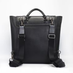 Unisex black backpack. Mens Backpack, womens backpack. Crafted in sleek Italian saffiano leather with python detail. Gregory has a modern slim profile with space for a laptop, tablet or iPad. Luxury Laptop Bag With Adjustable Strap For On-the-go, Modern Satchel With Gunmetal Hardware For On-the-go, Luxury Leather Laptop Bag For On-the-go, Luxury Everyday Backpack With Adjustable Strap, Leather Workwear Backpack With Detachable Strap, Leather Work Backpack With Detachable Strap, Designer Leather Backpack For Business With Adjustable Strap, Modern Leather Backpack For Work With Adjustable Strap, Luxury Workwear Backpack With Detachable Strap