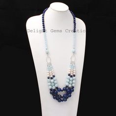 Product Details : ITEM : AQUAMARINE, LAPIS LAZULI, PEARL BEADED NECKLACEItem Code : DGC2539Gemstone Name :  AQUAMARINE, LAPIS LAZULI, PEARLChain Style : BEADEDBeads Shape : Smooth Round/RondelleBeads Size : 6mm/7mm/10mm/12 mm ApproxLength : 24"-26" Inch ApproxWeight : 530 Cts. ApproxCustomization : **Available**Please Feel Free To Contact If You Have Any Query. Blue Oval Faceted Bead Jewelry, Blue Oval Bead Necklaces, Blue Beaded Oval Necklaces, Blue Natural Stone Beaded Necklaces With Oval Beads, Blue Oval Gemstone Beads, Blue Faceted Beads Crystal Necklaces, Blue Oval Beaded Necklaces With Natural Stones, Blue Oval Beaded Necklaces, Blue Beaded Necklaces With Oval Beads