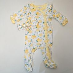 Modern Baby Footed Lemon Print Pajamas With Bow. 100% Cotton. Washed But Never Worn Playful Yellow Long Sleeve Onesie, Playful Long Sleeve Yellow Onesie, Cute Yellow Long Sleeve Onesie, Yellow Long Sleeve Cotton Onesie, Spring Yellow Sleepwear For Sleepover, Spring Yellow Sleepwear For Nightwear, Playful Yellow Sleep Sets, Playful Yellow Sleep Set, Playful Yellow Sleepwear Set