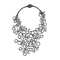 Eco-Friendly and Vegan Inner Tube Necklace Luxury is in each detail – Hubert de Givency. Our Octa Handcraft Black Statement Necklace is not short of wow factor and handcrafted details. Octa in Greek means eight. This black statement necklace is designed to look like there are multiple circles that represent 8. The black statement necklace is handcrafted using recycled tyre inner tubes in a way which is both eco-friendly and cruelty-free. The reclaimed rubber makes a great vegan leather substitut Otiumberg Necklace, Elegant Statement Necklace, Tube Necklace, Tyres Recycle, Necklace Luxury, Art Necklaces, Centre Piece, Inner Tube, Bib Necklaces