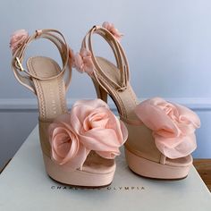 Blush Peachy Colored Floral Platform Heels By Charlotte Olympia. Style Is Called "Fleur". Worn Only On My Wedding Day. Soles Of Shoes Have A Nude Rubber Bottom. There Is Some Discoloring On The Back Top Of Heel And A Couple Small Spots On Some Of The Back Flowers/Ankle Area. But Otherwise They Are In Great Condition! Comes With Original Box And The Dust Bag. (Box Has Tear On Corner And Packing Tape On Bottom From Movers.) Underneath Is Signed By Charlotte Olympia From An In-Store Shopping Event At Nordstroms. Shoes Were Purchased From Neiman Marcus. Elegant Spring Wedding Shoes With Flower Design, Pink Spring Wedding Shoes, Feminine Spring Wedding Shoes With Padded Heel, Spring Wedding Shoes With Padded Heel, Spring Wedding Shoes Closed Toe For Gala, Chic Pink Wedding Shoes For Spring, Chic Wedding Heels With Flower Detail, Pink Heels For Spring Gala, Spring Gala Wedding Shoes With Round Toe